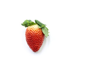 A red strawberry on a white background.