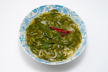 Sweet vegetable curry with rice vermicelli Local food on a bowl