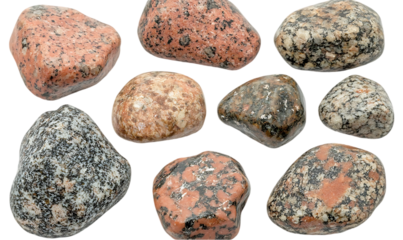 Assorted polished rocks, various colors and patterns, studio shot. Possible use design inspiration, educational resource