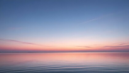 Obraz premium Simple calm blue sea, ocean under a sunset sky. Gradient sky, gradient sea, colourful, pink sky, purple sky, blue sky, orange sky. Calm mood, mood photo, sea, sky background. Landscape. heaven, dawn. 