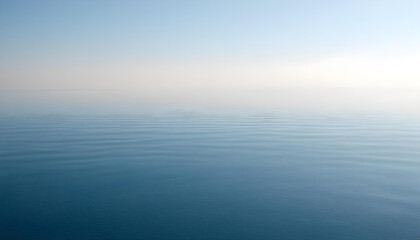 Obraz premium Simple calm blue sea, ocean under a blue sky. Calm mood, mood photo, sea, sky background. Landscape. heaven, dawn. Spiritual, wellness, meditation, summer, zen. 