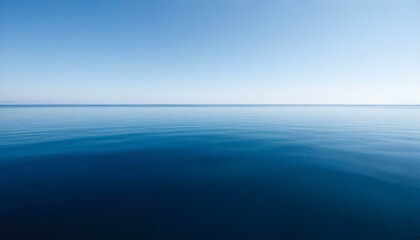 Obraz premium Simple calm blue sea, ocean under a blue sky. Calm mood, mood photo, sea, sky background. Landscape. heaven, dawn. Spiritual, wellness, meditation, summer, zen. 