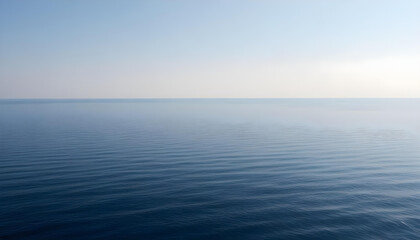 Fototapeta premium Simple calm blue sea, ocean under a blue sky. Calm mood, mood photo, sea, sky background. Landscape. heaven, dawn. Spiritual, wellness, meditation, summer, zen. 