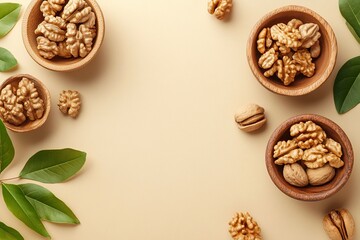 Fototapeta premium Four wooden bowls with walnuts on a beige background, top view. White space for text. On the table, there are also some leaves and nuts scattered around. High-resolution photography,