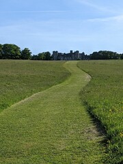 field, grass, landscape, road, nature, green, meadow, sky, rural, summer, countryside, blue, country, farm, path, hill, horizon
