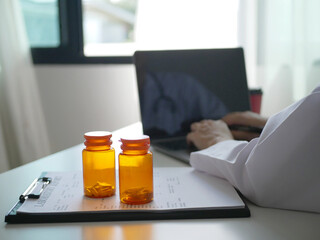 A close-up of a female doctor explaining the instructions for the medication to a patient during...