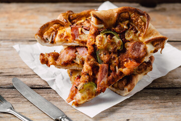 pizza on wooden background