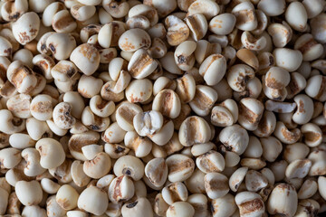 Job's tears on wooden background