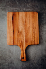 cutting board on wooden board