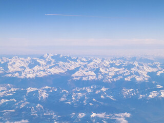 The Alps seen from an airplane window.