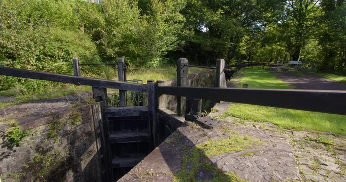Closed lock gates at resolven lock on the neath canal at resolven