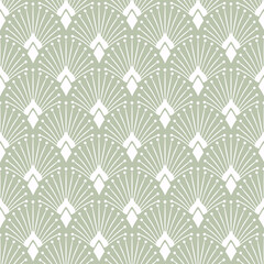 Seamless art deco pattern. White ornament on a light green background.