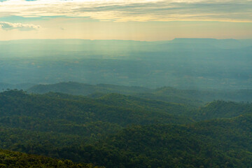 View of Mountain Tops on a Warm Summer Day – Clouds in the Sky Over the Way to Phu Hin Rong Kla and Phu Lom Lo. Scenic Landscape of Phitsanulok, Thailand. Nature, Travel, and Adventure Destination.