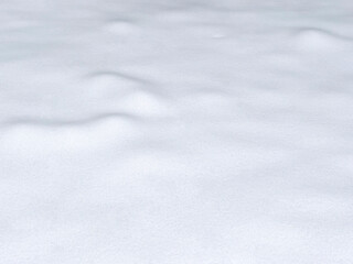 Background of different shapes under fresh snow cover