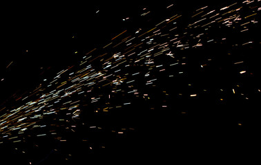 A black and white photo of a firework display with a lot of sparks