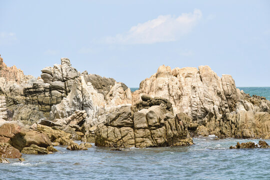 rocks on the blue sea of ​​Puerto Escondido Oaxaca, Mexico