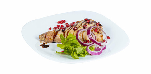 A delicious arrangement of meat, onions, and pomegranate seeds