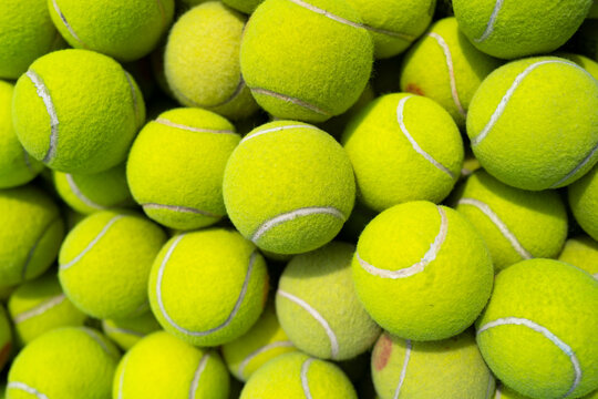 Tennis ball background. Sport and game set. Yellow tennis ball texture. Tennis pattern. Playful tennis background. Sporty yellow ball texture. Game set and match.