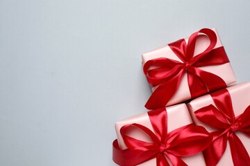 Beautiful gift boxes on gray background