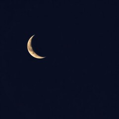 Ethereal Crescent Moon in Gentle Nocturnal Light