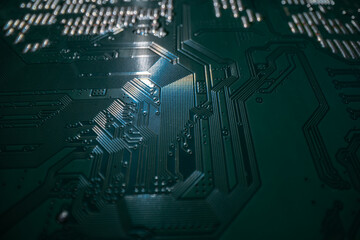 Electronic circuit board technology background. Electronic plate pattern. Circuit board, electrical scheme. Technology background. Electronic microcircuit with microchips and capacitors taken.