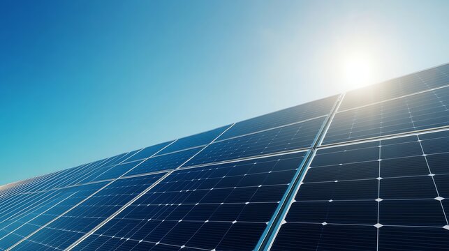 a hyper-realistic image of large, modern solar panels installed in a grid pattern under a clear, vibrant blue sky. The solar panels are clean, reflective, and positioned at an angle, highlighting thei