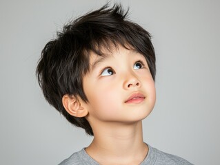 Young boy maintaining healthy teeth and gums with diligent toothbrushing routine