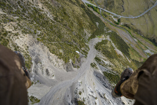 Friends hike and fly paragliding adventure in New Zealand mountains