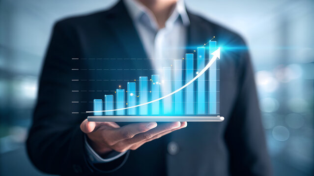 entrepreneurship tips startup scalability resilience A business professional displaying a digital growth chart on a tablet device.