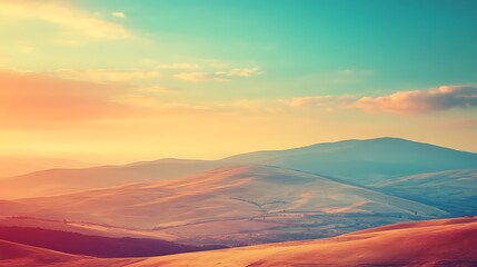 Obraz premium Serene Sunset Over Rolling Mountain Ranges