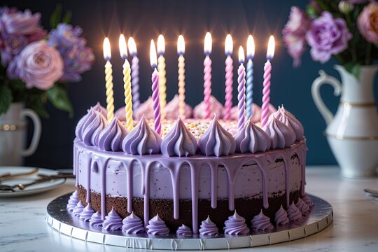 Elegant Birthday Cake with Colorful Candles Rich Chocolate and Soft Purple Icing on White Plate