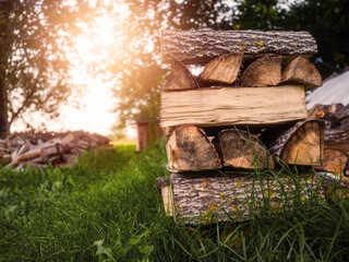 Stack of fire wood. Old style traditional heating material for fireplace or stove. Living in...