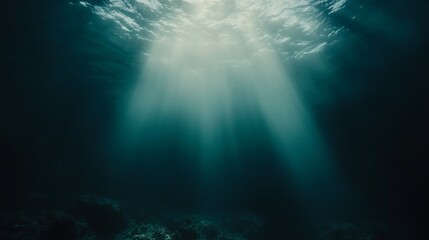 Fototapeta premium Sunbeams Illuminate The Dark Ocean Depths