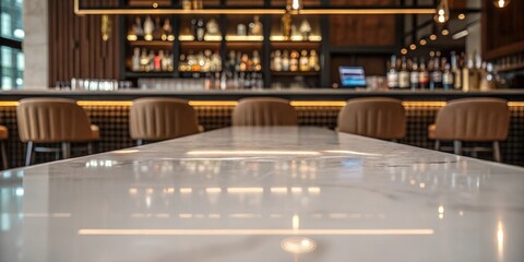  A stylish bar with a glossy marble tabletop in the foreground, featuring warm lighting, elegant seating, and a refined selection of premium liquor bottles.
