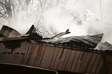 Firefighters confront raging flames amid dense smoke in a high-stakes rescue operation. Perfect for...