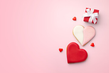 Valentines day background, love heart cookies with gift box, top view