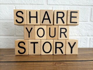 Fototapeta premium Wooden blocks with bold black letters spell out 