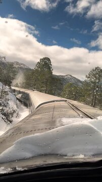Snowy train journey through the Sierra de Chihuahua, scenic Chepe tour in winter