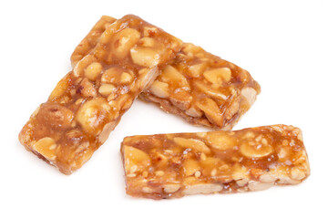 Top view honey bars with peanuts, sesame isolated on white background.