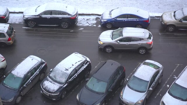 Top view  car driving on parking road place. Car traffic and parking concept.