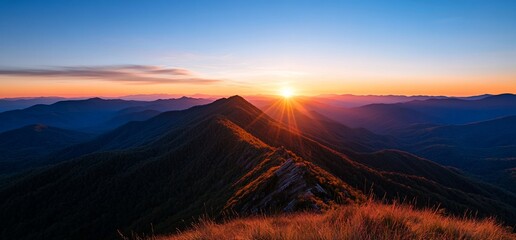 Majestic Mountain Ridge Shimmers Under the Radiant Glow of a Sunrise