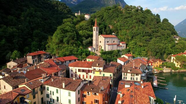 Italy, Scenic lake Lago di Lugano, beautiful valley Valsolda and charming authentic village San Mamete. Border with Switzerland. aerial 4k hd drone video