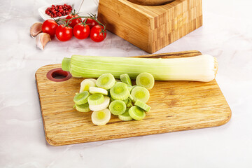 Ripe sliced leek over board