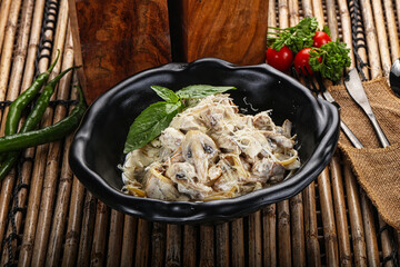 Italian pasta with chicken and mushrooms