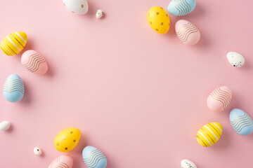 Decorative pastel-colored Easter eggs arranged on a soft pink background, evoking springtime joy and celebration. Enhance your designs with this festive and cheerful composition