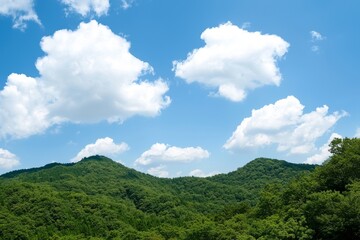World Environment Day is symbolized by the image of green mountains and beautiful blue sky clouds
