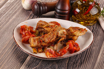 Baked lamb ribs with vegetables