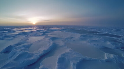 Obraz premium Vast icy landscape at dawn, soft light illuminating snow-covered terrain, peaceful and serene winter scene with ample space for text.