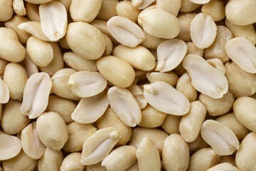 Peanuts and halves background. Top view