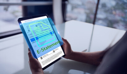 financial e-statement eco friendly reducing paper concept.Hand using digital tablet